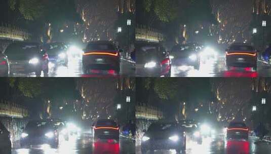慢动作拍摄下雨天夜晚的街道高清在线视频素材下载