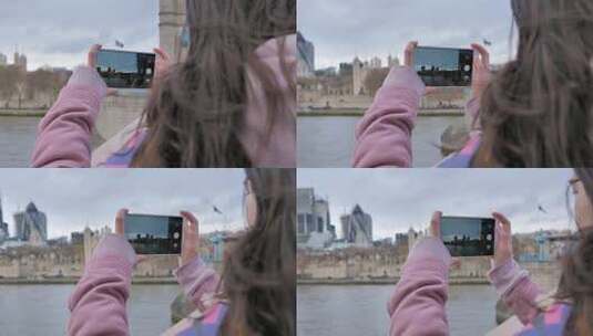 女孩在英国伦敦塔桥旅游用手机拍照高清在线视频素材下载
