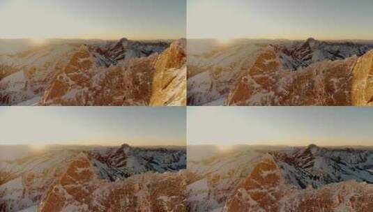 航拍阳光下的雪山日出巍峨山峰高清在线视频素材下载