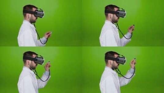 男人通过虚拟眼镜进行研究绿屏高清在线视频素材下载