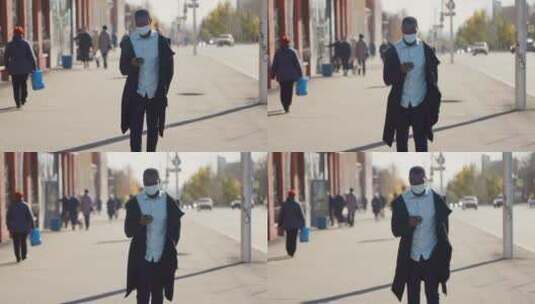 戴口罩的男士在街上行走高清在线视频素材下载