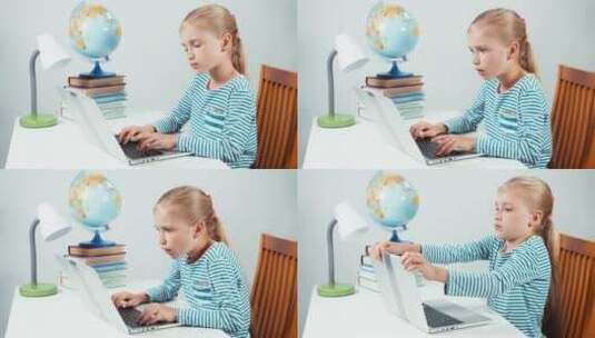 女孩看着电脑上的信息高清在线视频素材下载