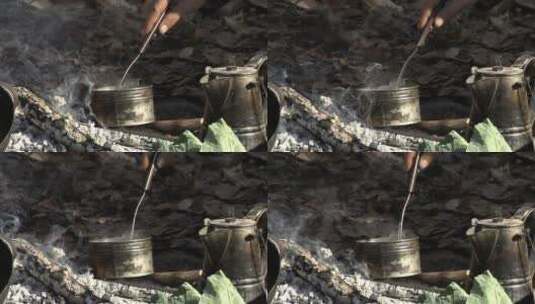内战时期用铁锅煮咖啡高清在线视频素材下载