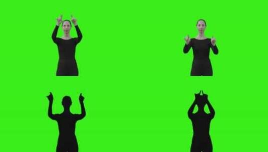 用手指画多个虚拟方块并在绿色虚拟键盘上打字的女人高清在线视频素材下载