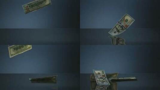 100美元的钞票落在反光面上高清在线视频素材下载