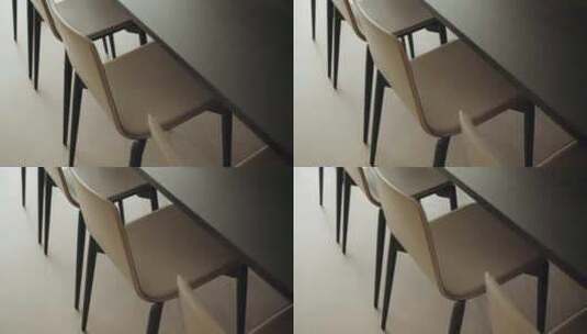 现代厨房木制餐桌附近舒适的空椅子特写高清在线视频素材下载