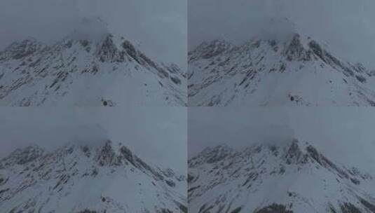 西藏林芝地区墨脱县多雄拉雪山高空航拍高清在线视频素材下载