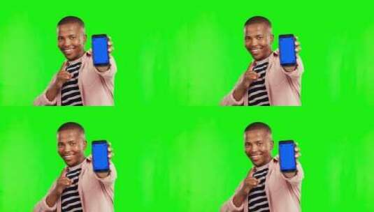 快乐的黑人，手机和绿屏模型，用于工作室背高清在线视频素材下载