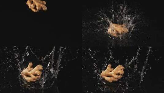 生姜，生姜，黑色背景下的水中落根，慢动作高清在线视频素材下载
