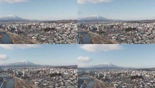 城市建筑，河流，雪山，冬季雪高清在线视频素材下载