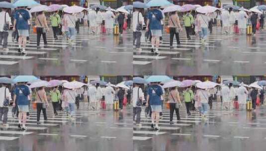 下雨天城市人流人群斑马线过马路暴雨天气高清在线视频素材下载