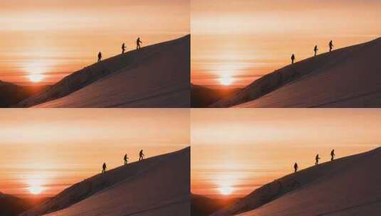 夕阳下登山者在爬山航拍【4K】高清在线视频素材下载