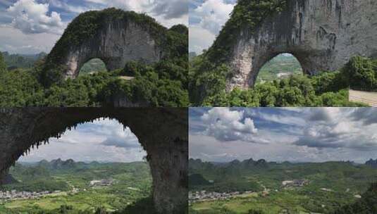 壮观的天然岩石拱门与葱郁山林景色高清在线视频素材下载