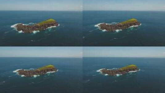 航拍海洋中的岩石岛高清在线视频素材下载