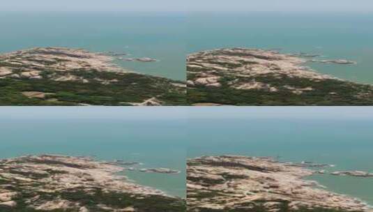 航拍蓝色海洋礁石岛屿大海海浪沙滩高清在线视频素材下载