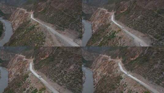 4k西藏丙察察山路视频航拍藏区艰险沿江土路高清在线视频素材下载