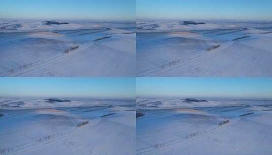 航拍冬日冰雪覆盖的原野高清在线视频素材下载