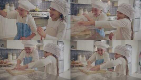 两个小女孩在厨房玩面粉高清在线视频素材下载