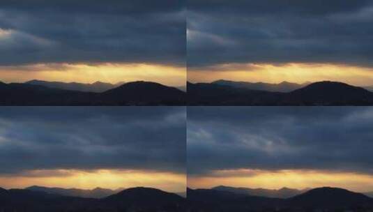 山峰阳光云朵太阳光耶稣光丁达尔光穿过云层高清在线视频素材下载