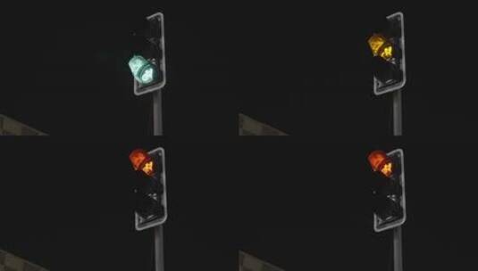 夜晚交通灯绿灯变换高清在线视频素材下载