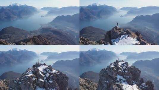 在意大利科莫欧洲阿尔卑斯山山顶徒步旅行者周围飞行高清在线视频素材下载