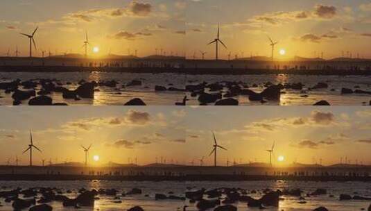 夕阳下风车海滩高清在线视频素材下载