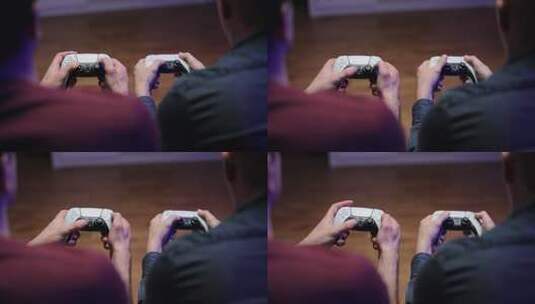 纽约——2021年3月7日：玩家双手使用操纵杆在控制台上玩足球足球模拟器视频游戏的特写镜头。索尼PlayStation 5电视游戏机的两个操纵杆高清在线视频素材下载