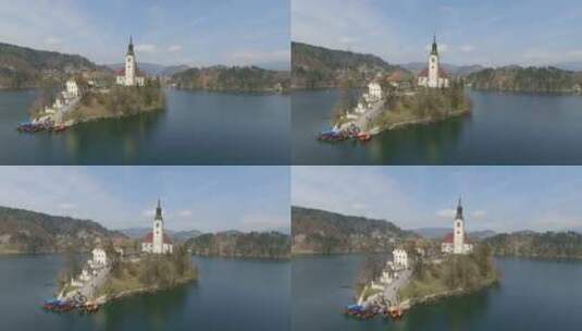 湖中间有一座小教堂的岛屿鸟瞰图高清在线视频素材下载