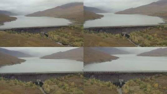 苏格兰西北高地克鲁兰尼湖上克鲁兰尼大坝的鸟瞰图高清在线视频素材下载