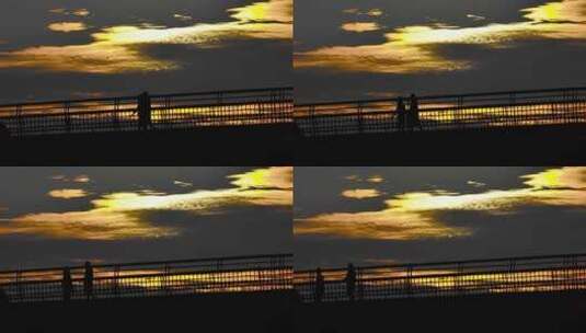 日余晖下天桥上的行人升格镜头高清在线视频素材下载