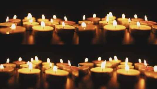 一排点燃的小蜡烛高清在线视频素材下载