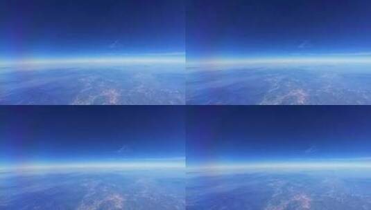 飞机窗外的云层陆地山脉高清在线视频素材下载