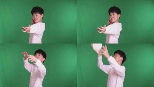 帅气的中国小男孩接住毛绒玩具唯美慢镜头高清在线视频素材下载