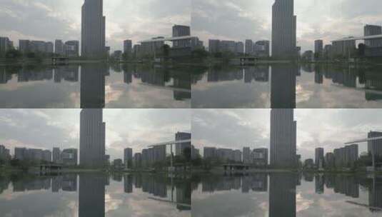 新川之心公园 新川OPPO大厦写字楼湖面高清在线视频素材下载
