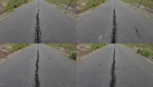 俯拍开裂的柏油路面高清在线视频素材下载