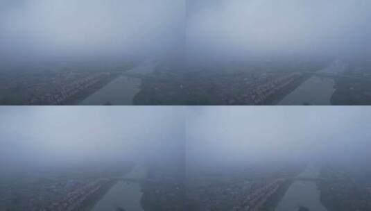 雾霾城市河流车流沿河建筑高楼建筑工地横移高清在线视频素材下载
