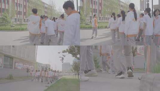 校园中初中生列队在校园中行走高清在线视频素材下载