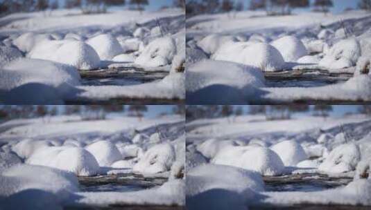 高清实拍雪地中流淌的小河流水高清在线视频素材下载