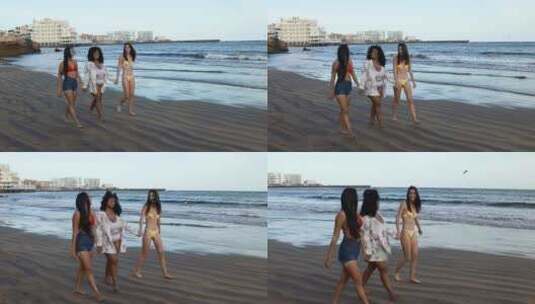 快乐的女性走在海滩上高清在线视频素材下载