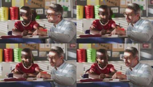 不同的快乐男老师帮助男生坐在教室里学习高清在线视频素材下载