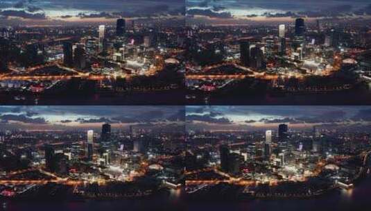 航拍上海滨江两岸城市CBD建筑群夜景高清在线视频素材下载