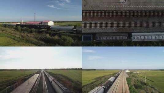 4K航拍东北老绿皮火车站穿梭稻田铁路运输高清在线视频素材下载
