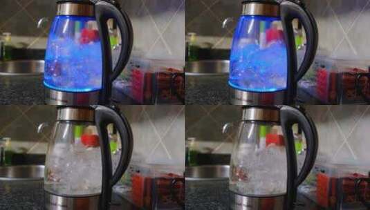 电热水壶里的沸水高清在线视频素材下载