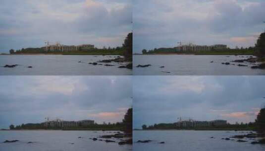 单镜头夜幕降临海边建筑延时视频高清在线视频素材下载