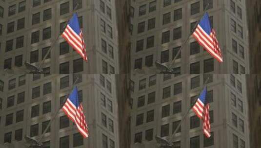 莱斯勒大厦上插着美国国旗特写高清在线视频素材下载
