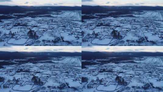 航拍林区冬季森林小镇雪景高清在线视频素材下载