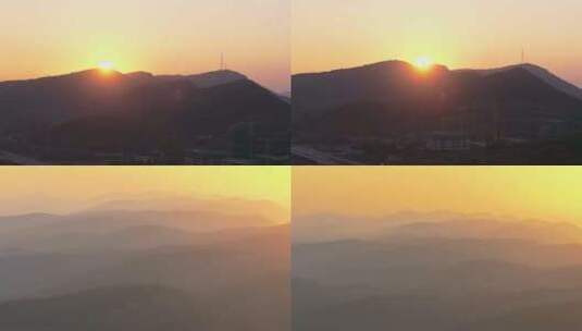 航拍云雾缭绕的枣庄山脉晨曦高清在线视频素材下载