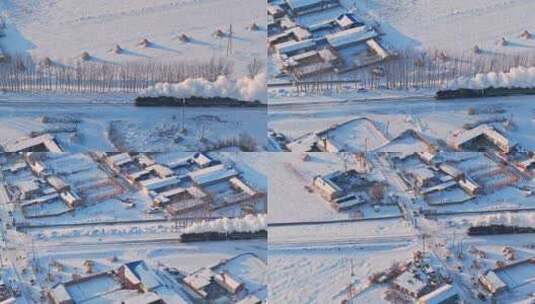 航拍中国东北冬季雪景中的蒸汽火车穿过村庄高清在线视频素材下载