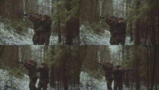 在森林里组队狩猎的猎人高清在线视频素材下载