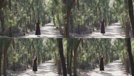 美女走在森林里行走树林里散步女性亲近自然高清在线视频素材下载